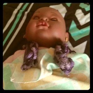 I am selling a baby hand knit scarf.